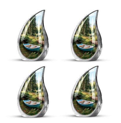 Dark Black Boat Cremation Urn close-up of engraving and surface detail - smooth teardrop contour featuring boat art - 10 inch aluminum urn for cremated remains