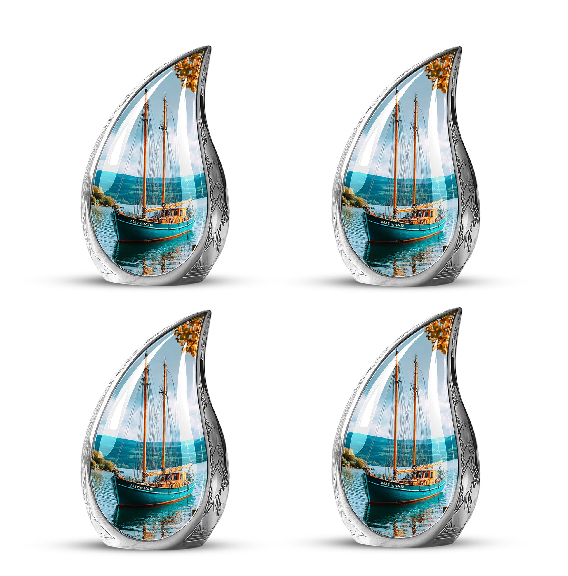 Aqua Teal Boat Cremation Urn close-up of engraving and surface detail - graceful tear-shaped urn with boat motif - 10 inch aluminum urn for cremated remains