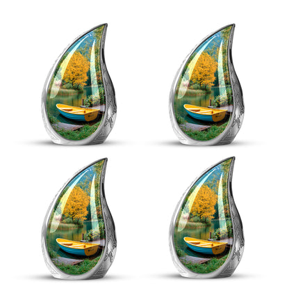 Sea Green Teal Boat Cremation Urn close-up of engraving and surface detail - rounded teardrop boat design with delicate detail - 10 inch aluminum urn for cremated remains