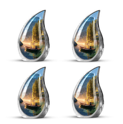 Burnished Gold Boat Cremation Urn close-up of engraving and surface detail - smooth teardrop contour featuring boat art - 10 inch aluminum urn for cremated remains