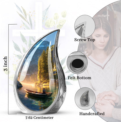 Antique Gold Boat Cremation Urn angled view of lid and engraved motif - rounded teardrop boat design with delicate detail - mini keepsake memorial for portion of cremation ashes