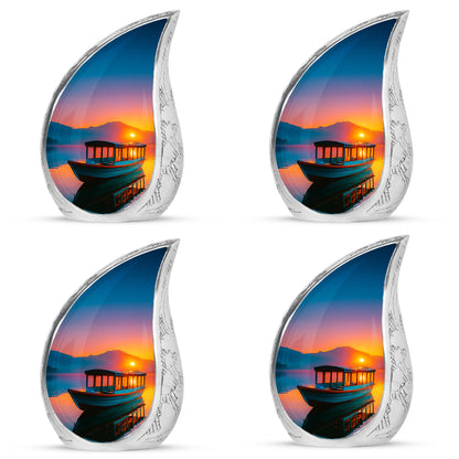 Garnet Red Boat Cremation Urn close-up of engraving and surface detail - rounded teardrop boat design with delicate detail - 10 inch aluminum urn for cremated remains