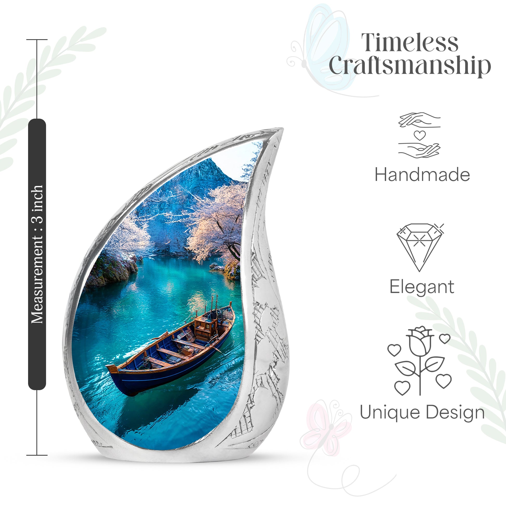 Celestial Blue Boat Cremation Urn angled view of lid and engraved motif - rounded teardrop boat design with delicate detail - mini keepsake memorial for portion of cremation ashes