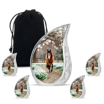 Champagne Gold Horse Cremation Urn side profile showing urn shape - rounded teardrop horse design with delicate detail - memorial set with one large and four small urns