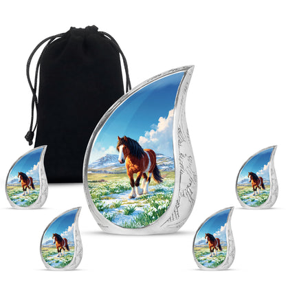 Dusty Blue Horse Cremation Urn side profile showing urn shape - flowing teardrop horse silhouette on curved aluminum - memorial set with one large and four small urns