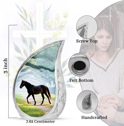 Vivid Teal Horse Cremation Urn angled view of lid and engraved motif - smooth teardrop contour featuring horse art - mini keepsake memorial for portion of cremation ashes