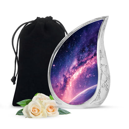 Dusty Blue Galaxy Cremation Urn front view showing detailed design - flowing teardrop galaxy silhouette on curved aluminum - full-size 10 inch 200 cubic inch adult cremation urn