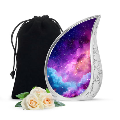 Slate Blue Galaxy Cremation Urn front view showing detailed design - flowing teardrop galaxy silhouette on curved aluminum - full-size 10 inch 200 cubic inch adult cremation urn