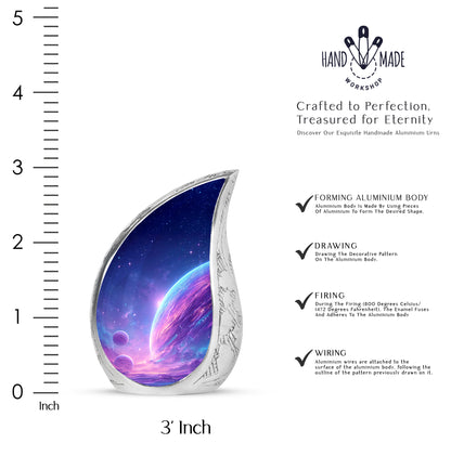 Calming Blue Galaxy Cremation Urn angled view of lid and engraved motif - smooth teardrop contour featuring galaxy art - mini keepsake memorial for portion of cremation ashes