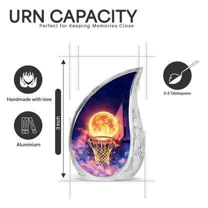 Celestial Blue Basketball Cremation Urn angled view of lid and engraved motif - flowing teardrop basketball silhouette on curved aluminum - mini keepsake memorial for portion of cremation ashes
