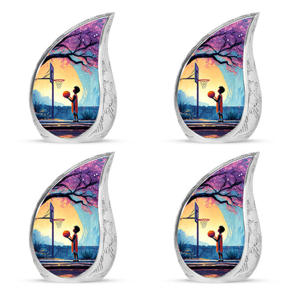 Sky Blue Basketball Cremation Urn close-up of engraving and surface detail - flowing teardrop basketball silhouette on curved aluminum - 10 inch aluminum urn for cremated remains