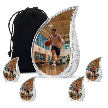 Royal Gold Basketball Cremation Urn side profile showing urn shape - smooth teardrop contour featuring basketball art - memorial set with one large and four small urns