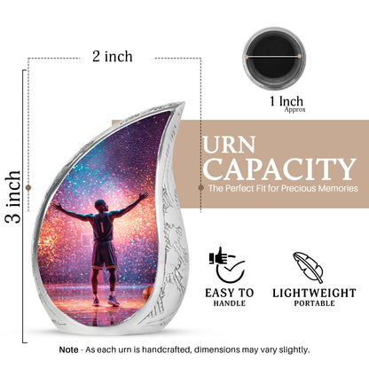 Cobalt Blue Basketball Cremation Urn angled view of lid and engraved motif - graceful tear-shaped urn with basketball motif - mini keepsake memorial for portion of cremation ashes