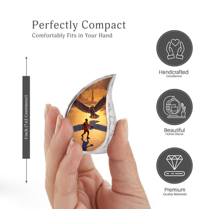 Matte Gold Basketball Cremation Urn angled view of lid and engraved motif - smooth teardrop contour featuring basketball art - mini keepsake memorial for portion of cremation ashes