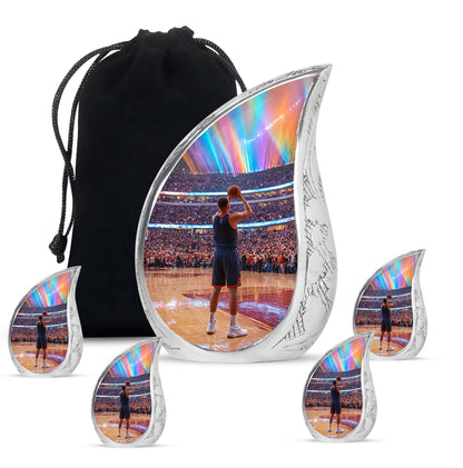 Charcoal Black Basketball Cremation Urn side profile showing urn shape - smooth teardrop contour featuring basketball art - memorial set with one large and four small urns