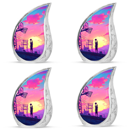 Pastel Blue Basketball Cremation Urn close-up of engraving and surface detail - flowing teardrop basketball silhouette on curved aluminum - 10 inch aluminum urn for cremated remains