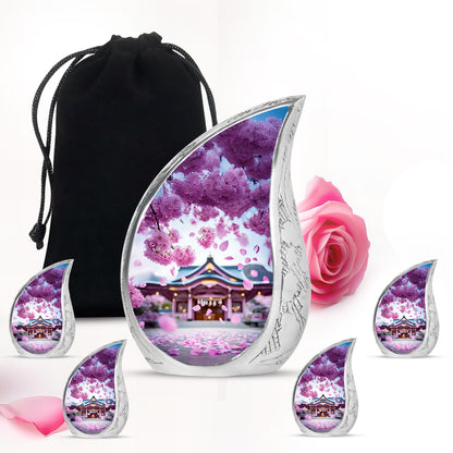 Rose Pink Cherry Blossom Cremation Urn side profile showing urn shape - flowing teardrop cherry blossom silhouette on curved aluminum - memorial set with one large and four small urns