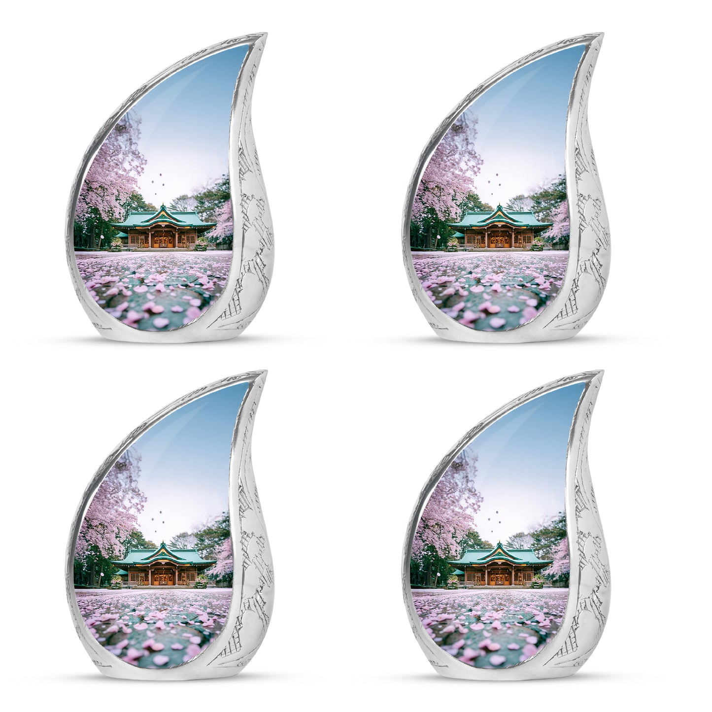 Ivory White Cherry Blossom Cremation Urn close-up of engraving and surface detail - rounded teardrop cherry blossom design with delicate detail - 10 inch aluminum urn for cremated remains