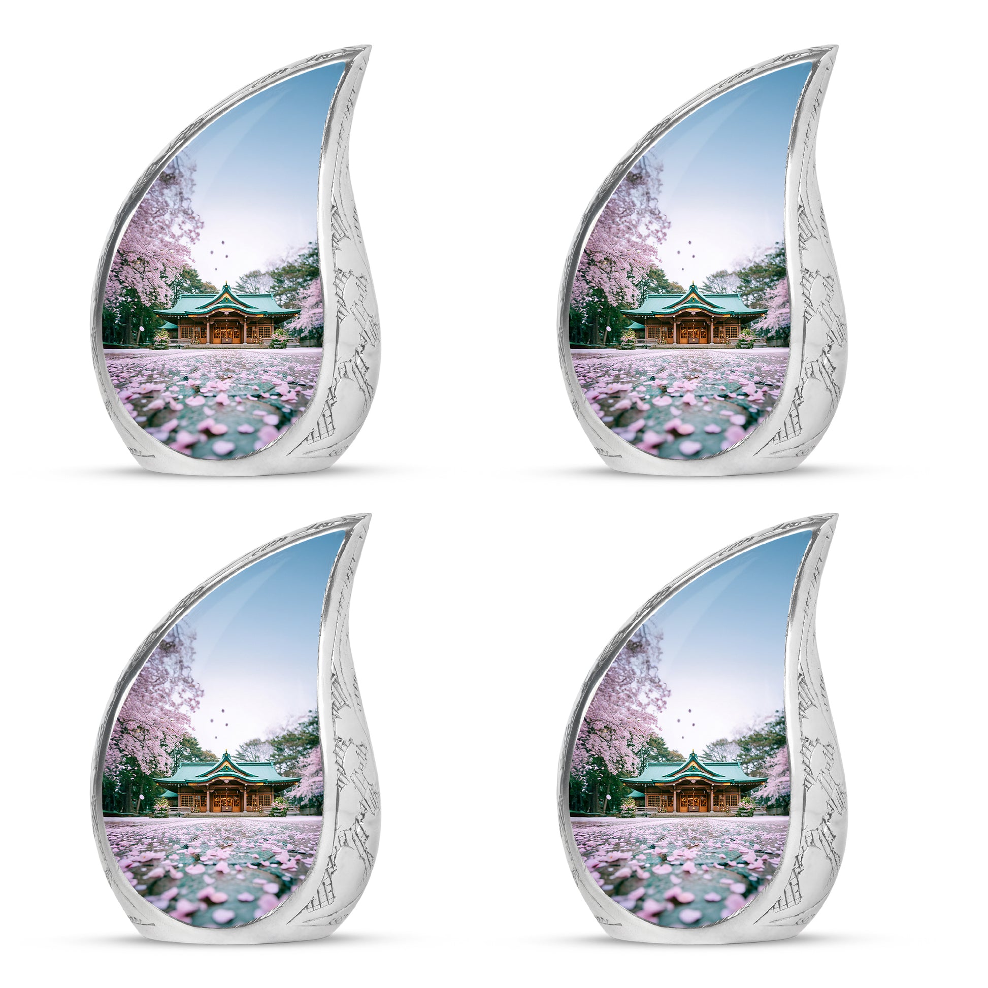Ivory White Cherry Blossom Cremation Urn close-up of engraving and surface detail - rounded teardrop cherry blossom design with delicate detail - 10 inch aluminum urn for cremated remains