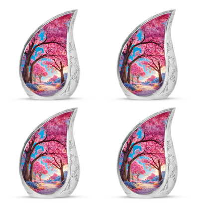 Bright Blue Cherry Blossom Cremation Urn close-up of engraving and surface detail - smooth teardrop contour featuring cherry blossom art - 10 inch aluminum urn for cremated remains