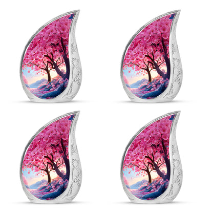 Peony Pink Cherry Blossom Cremation Urn close-up of engraving and surface detail - flowing teardrop cherry blossom silhouette on curved aluminum - 10 inch aluminum urn for cremated remains