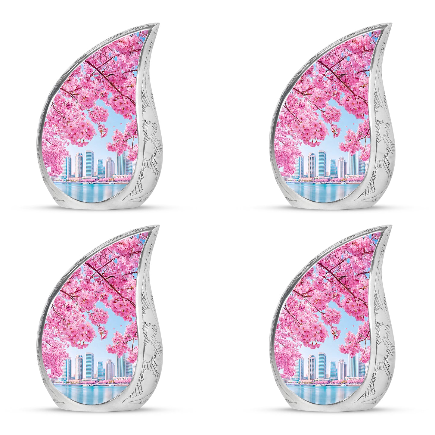 Cornflower Blue Cherry Blossom Cremation Urn close-up of engraving and surface detail - graceful tear-shaped urn with cherry blossom motif - 10 inch aluminum urn for cremated remains