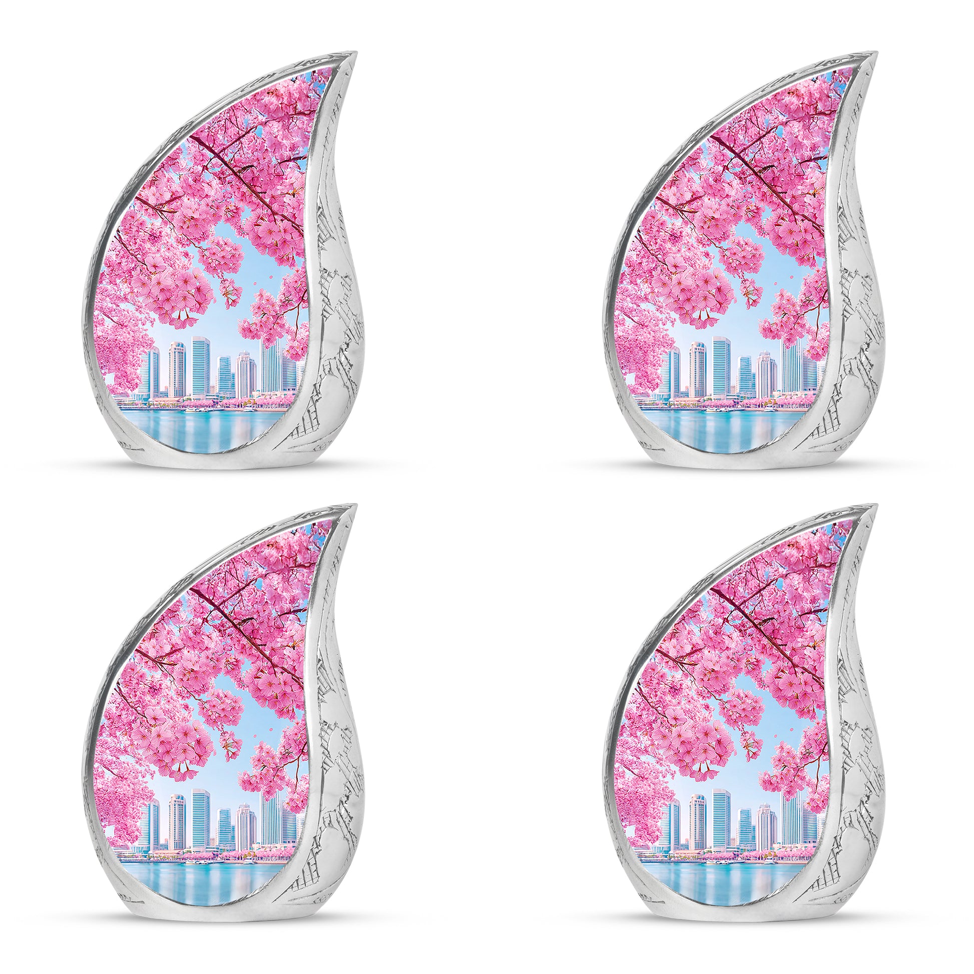 Cornflower Blue Cherry Blossom Cremation Urn close-up of engraving and surface detail - graceful tear-shaped urn with cherry blossom motif - 10 inch aluminum urn for cremated remains