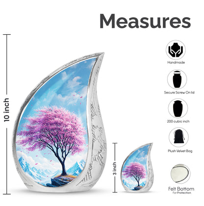 Calming Blue Cherry Blossom Cremation Urn angled view of lid and engraved motif - graceful tear-shaped urn with cherry blossom motif - mini keepsake memorial for portion of cremation ashes