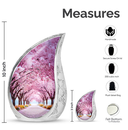 Pastel Pink Cherry Blossom Cremation Urn angled view of lid and engraved motif - rounded teardrop cherry blossom design with delicate detail - mini keepsake memorial for portion of cremation ashes
