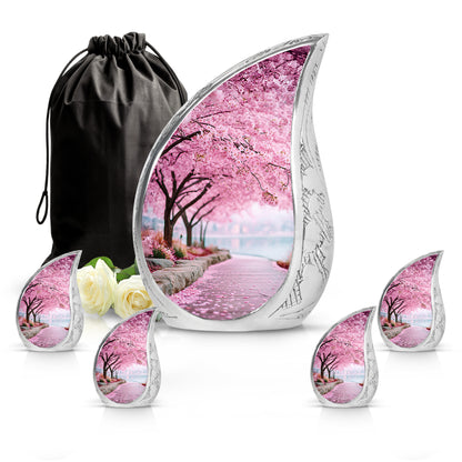 Coral Pink Cherry Blossom Cremation Urn side profile showing urn shape - rounded teardrop cherry blossom design with delicate detail - memorial set with one large and four small urns