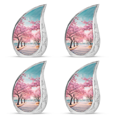 Jewel Teal Cherry Blossom Cremation Urn close-up of engraving and surface detail - rounded teardrop cherry blossom design with delicate detail - 10 inch aluminum urn for cremated remains