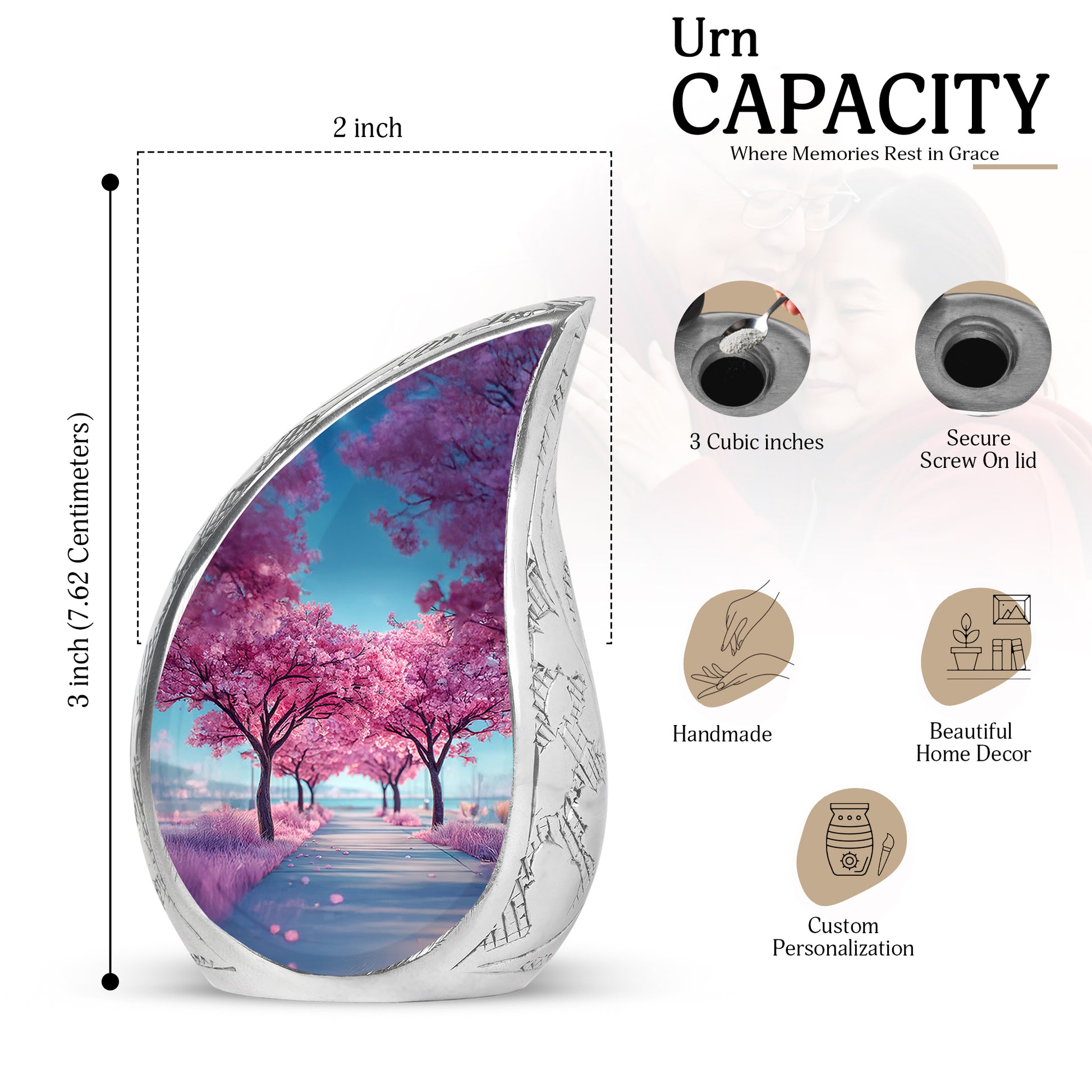 Icy Blue Cherry Blossom Cremation Urn angled view of lid and engraved motif - flowing teardrop cherry blossom silhouette on curved aluminum - mini keepsake memorial for portion of cremation ashes