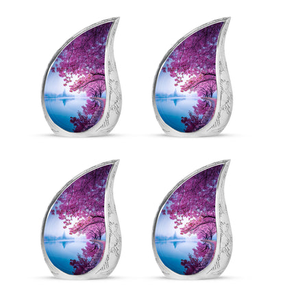 Steel Blue Cherry Blossom Cremation Urn close-up of engraving and surface detail - smooth teardrop contour featuring cherry blossom art - 10 inch aluminum urn for cremated remains