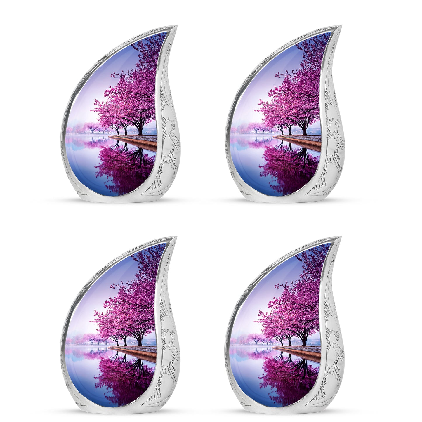 Snow White Cherry Blossom Cremation Urn close-up of engraving and surface detail - flowing teardrop cherry blossom silhouette on curved aluminum - 10 inch aluminum urn for cremated remains