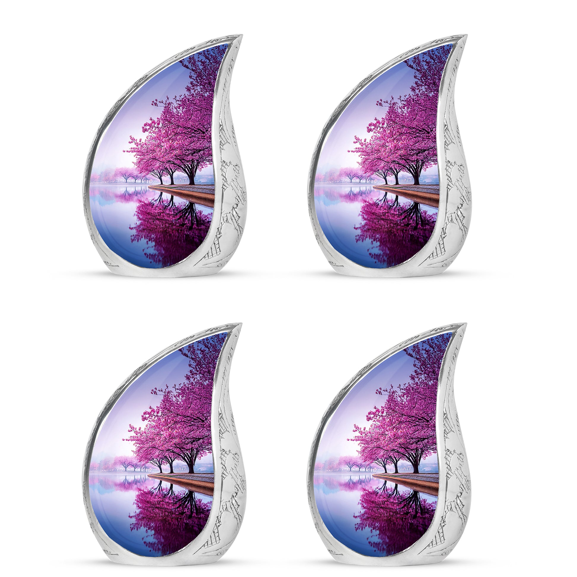Snow White Cherry Blossom Cremation Urn close-up of engraving and surface detail - flowing teardrop cherry blossom silhouette on curved aluminum - 10 inch aluminum urn for cremated remains