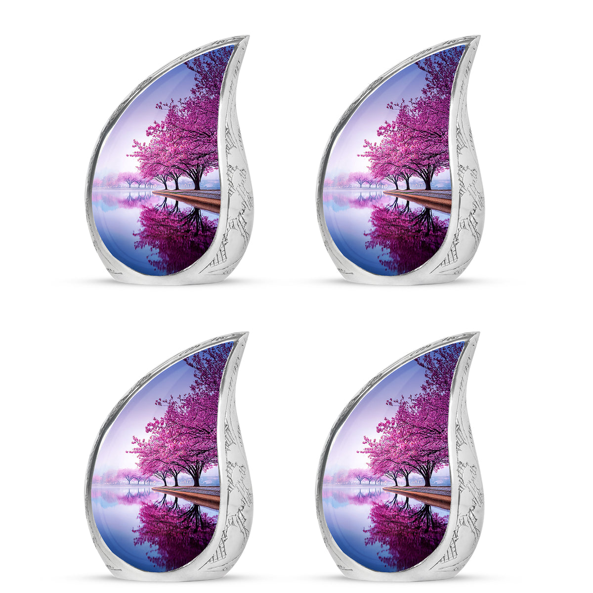 Snow White Cherry Blossom Cremation Urn close-up of engraving and surface detail - flowing teardrop cherry blossom silhouette on curved aluminum - 10 inch aluminum urn for cremated remains