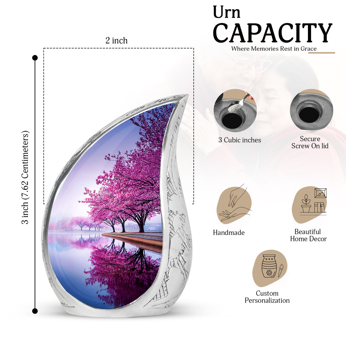 Alabaster White Cherry Blossom Cremation Urn angled view of lid and engraved motif - flowing teardrop cherry blossom silhouette on curved aluminum - mini keepsake memorial for portion of cremation ashes