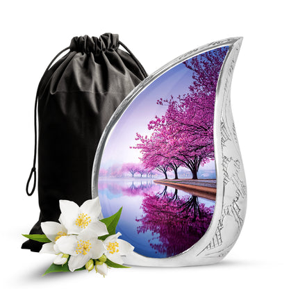 Porcelain White Cherry Blossom Cremation Urn front view showing detailed design - graceful tear-shaped urn with cherry blossom motif - full-size 10 inch 200 cubic inch adult cremation urn