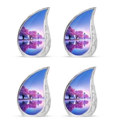 Alabaster White Cherry Blossom Cremation Urn close-up of engraving and surface detail - rounded teardrop cherry blossom design with delicate detail - 10 inch aluminum urn for cremated remains