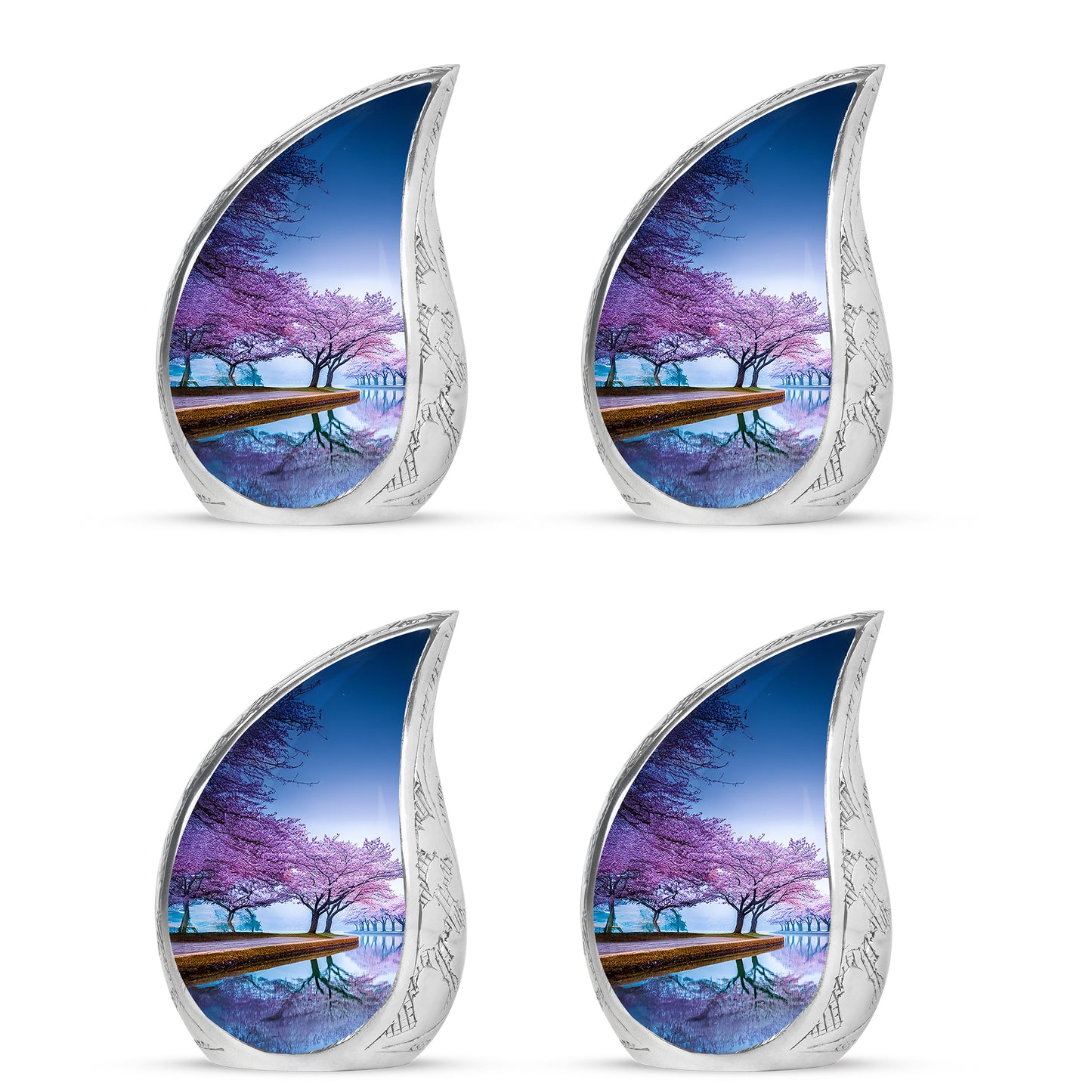 Powder Blue Cherry Blossom Cremation Urn close-up of engraving and surface detail - flowing teardrop cherry blossom silhouette on curved aluminum - 10 inch aluminum urn for cremated remains