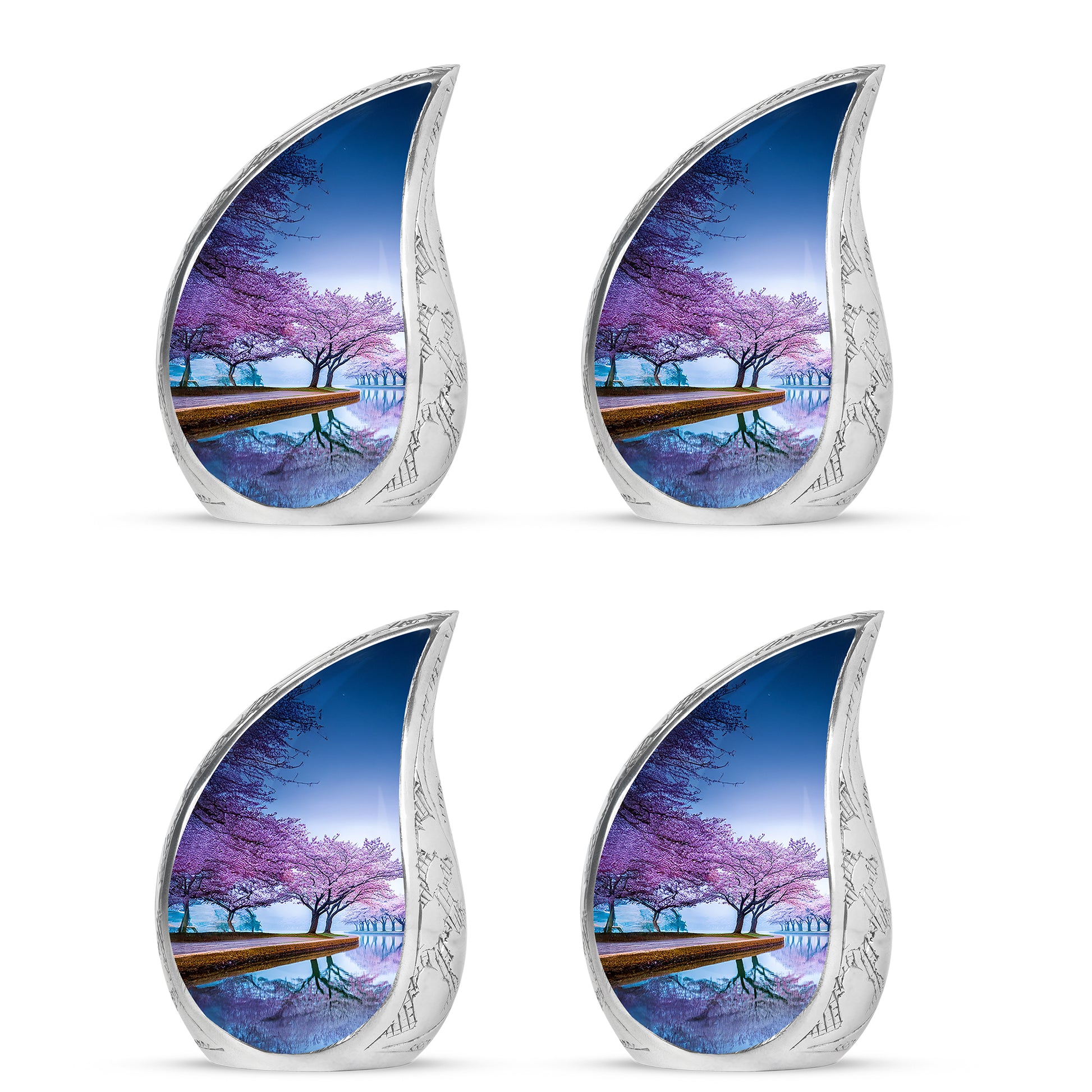 Powder Blue Cherry Blossom Cremation Urn close-up of engraving and surface detail - flowing teardrop cherry blossom silhouette on curved aluminum - 10 inch aluminum urn for cremated remains