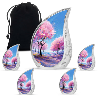 Royal Blue Cherry Blossom Cremation Urn side profile showing urn shape - graceful tear-shaped urn with cherry blossom motif - memorial set with one large and four small urns