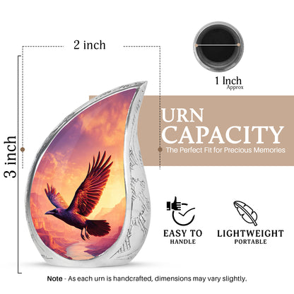 Grape Purple Crow Cremation Urn angled view of lid and engraved motif - graceful tear-shaped urn with crow motif - mini keepsake memorial for portion of cremation ashes