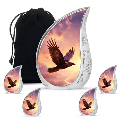 Petal Pink Crow Cremation Urn side profile showing urn shape - graceful tear-shaped urn with crow motif - memorial set with one large and four small urns