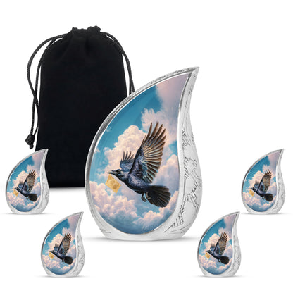 Sapphire Blue Crow Cremation Urn side profile showing urn shape - graceful tear-shaped urn with crow motif - memorial set with one large and four small urns