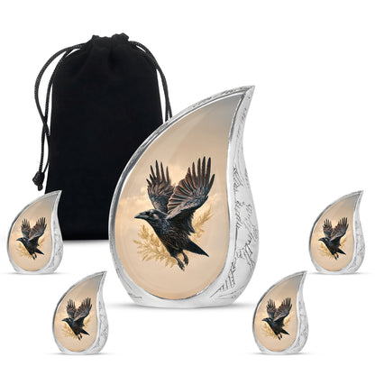 Amber Gold Crow Cremation Urn side profile showing urn shape - rounded teardrop crow design with delicate detail - memorial set with one large and four small urns