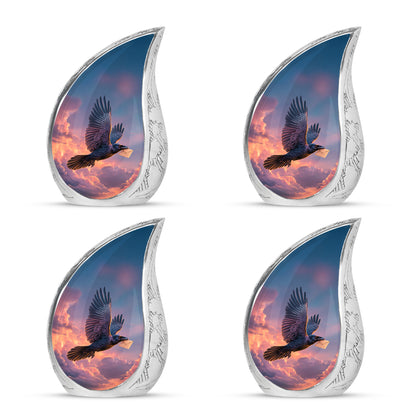 Misty Blue Crow Cremation Urn close-up of engraving and surface detail - flowing teardrop crow silhouette on curved aluminum - 10 inch aluminum urn for cremated remains