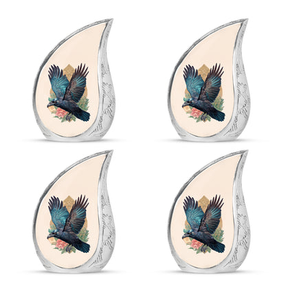 Amber Gold Crow Cremation Urn close-up of engraving and surface detail - rounded teardrop crow design with delicate detail - 10 inch aluminum urn for cremated remains
