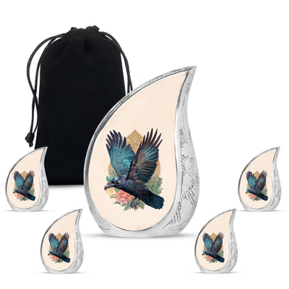 Warm Gold Crow Cremation Urn side profile showing urn shape - graceful tear-shaped urn with crow motif - memorial set with one large and four small urns