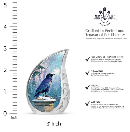 Celestial Blue Crow Cremation Urn angled view of lid and engraved motif - flowing teardrop crow silhouette on curved aluminum - mini keepsake memorial for portion of cremation ashes